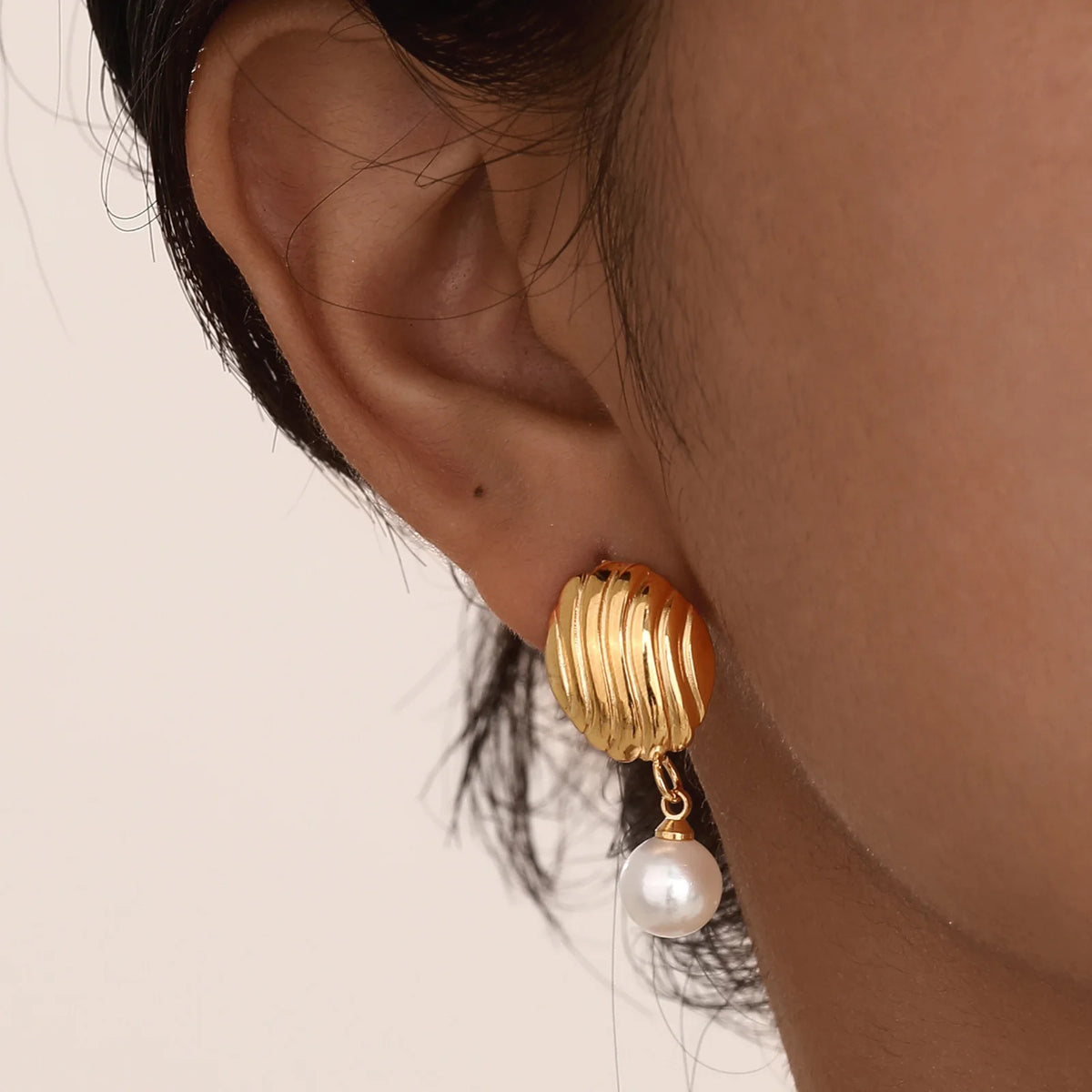 Brincos Nore Onda Dourada