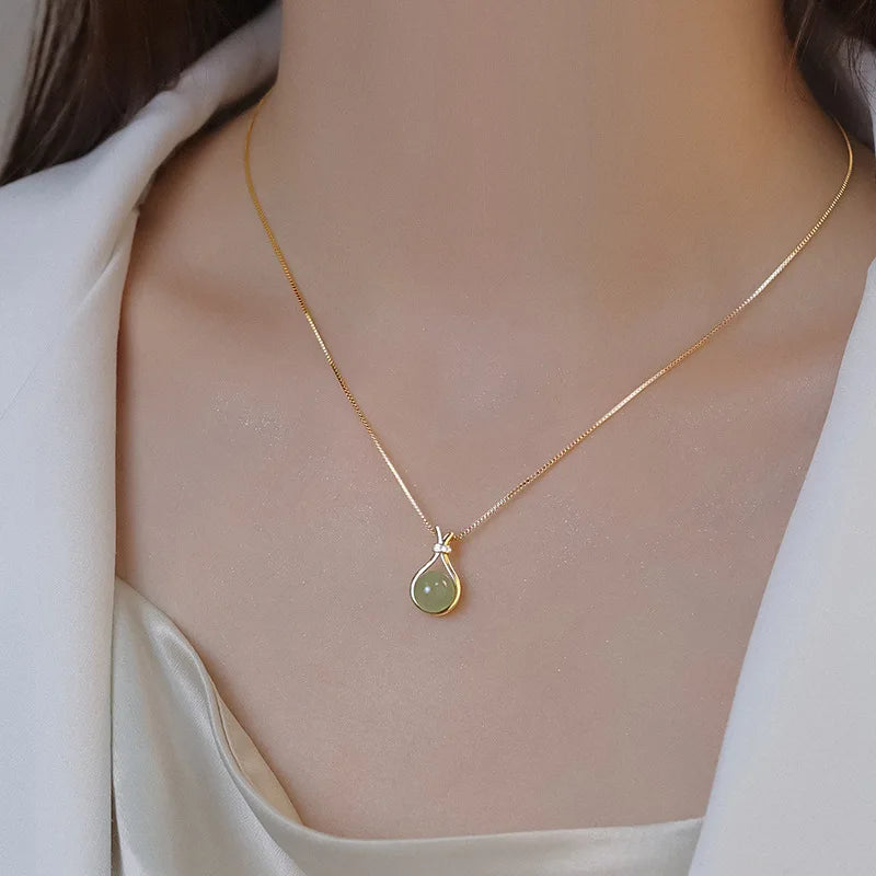 Pingente Jade oculta dourado