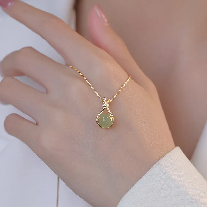 Pingente Jade oculta dourado