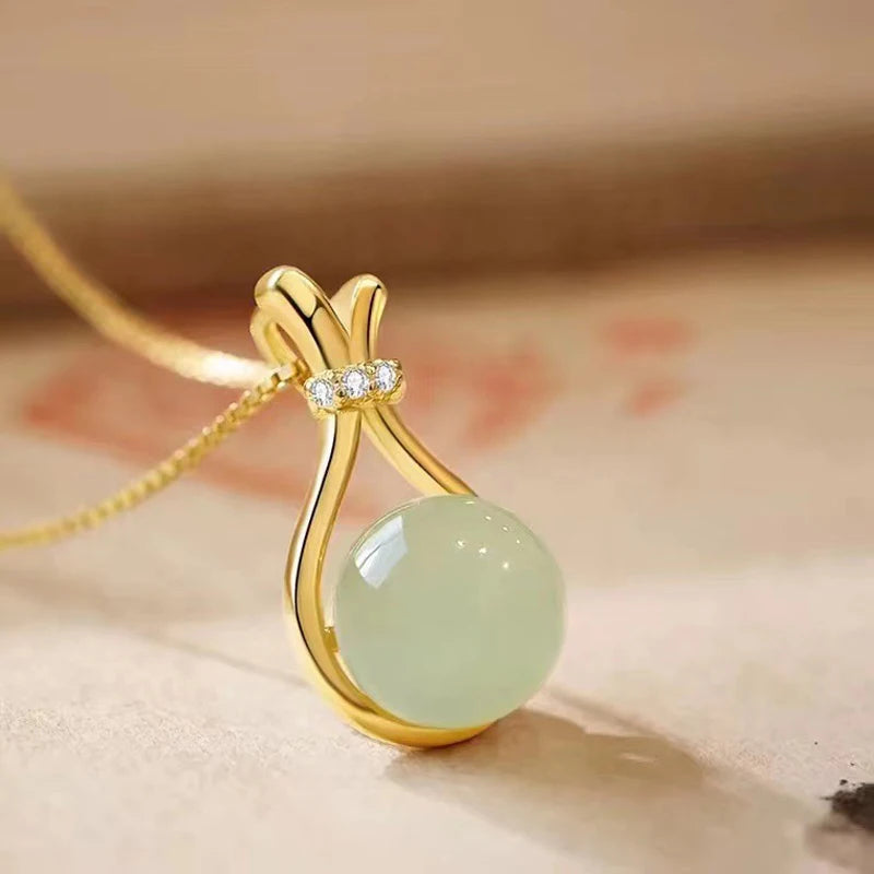 Pingente Jade oculta dourado