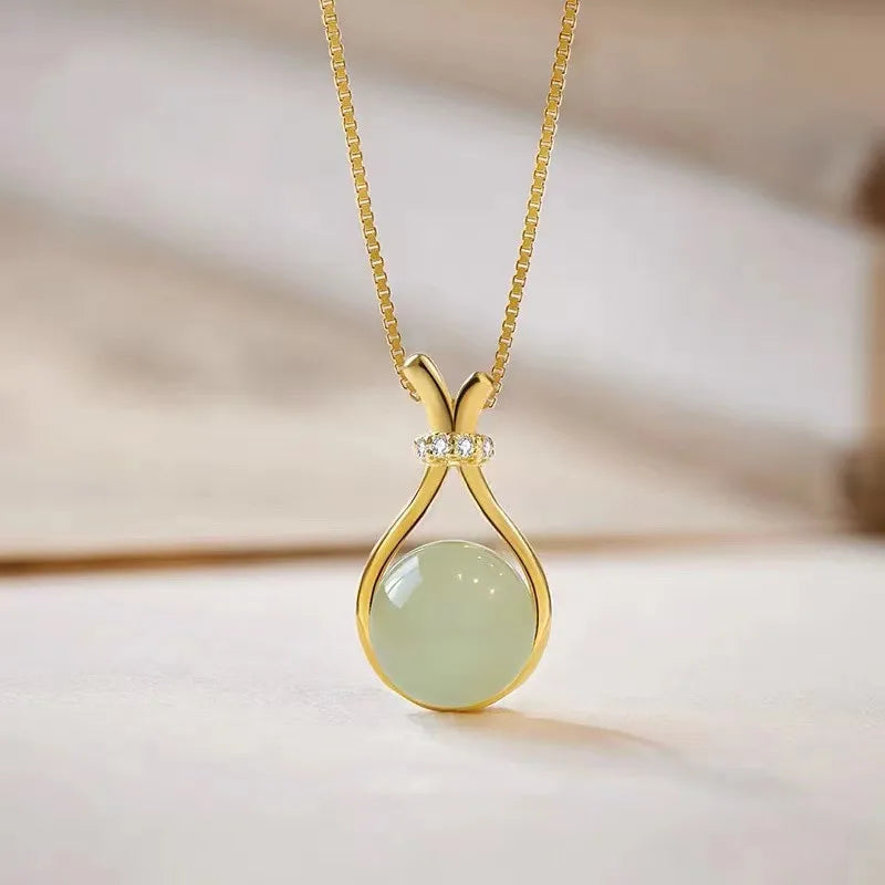 Pingente Jade oculta dourado